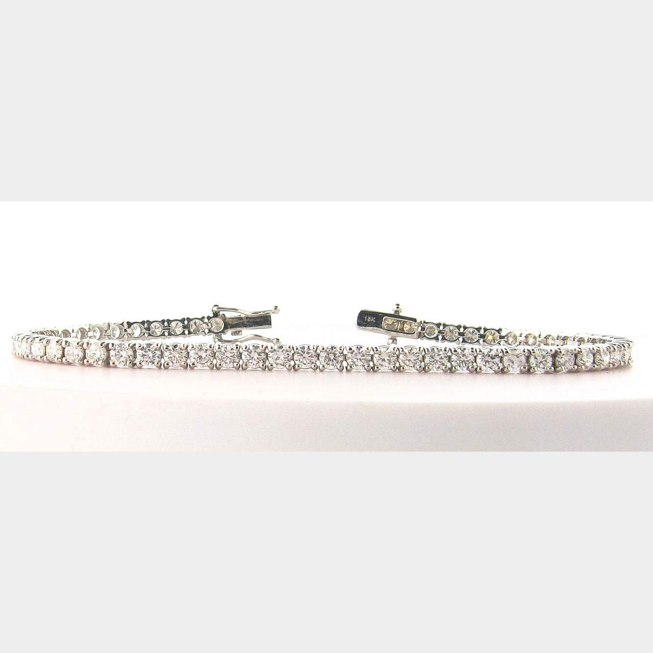 4.91 CT. Natural Round Brilliant Diamonds 18K White Gold Straight Line Tennis Bracelet.